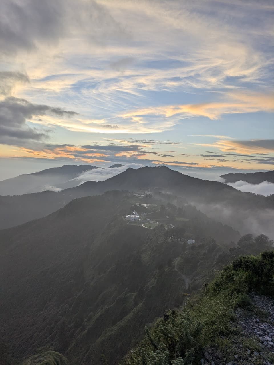 Sunrise over misty valley near George Everest's house